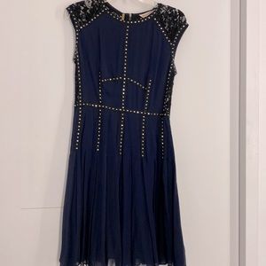 Rebecca Taylor size 10. Sleeveless silk and lace dress with grommet details.